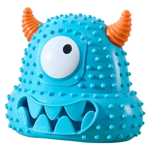 Blue monster dog toy with orange horns and textured rubber surface for cleaning teeth