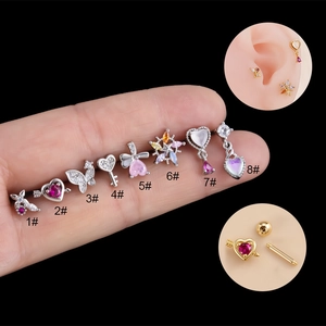 Pink zircon heart and butterfly stud earrings set with surgical steel screw-back closure