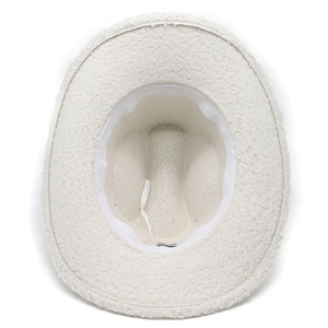 Detail view of cream western cowboy hat with sherpa wool texture and inner adjustable ribbon