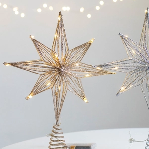 Lighted gold and silver metal wire star tree toppers with LED lights and spiral bases