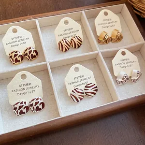 Set of six animal print geometric round stud earrings in zebra and leopard patterns