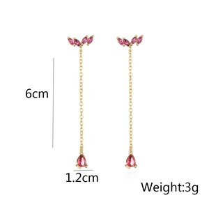 Detail view of 18K gold tassels earrings with pink gems and dimension annotations