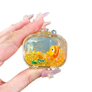 AirPods Pro liquid sand case with orange clownfish decor and glitter floating inside