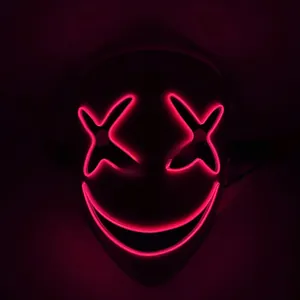 Detailed view of LED neon smiling mask with glowing magenta cross eyes and high brightness