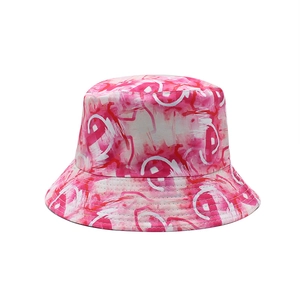 Detailed view of pink tie-dye bucket hat with artistic abstract line pattern print