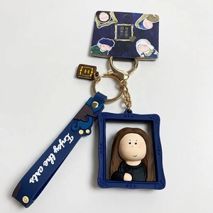 Creative artist Mona Lisa cartoon keychain with 3D blue frame and Enjoy the arts wrist strap