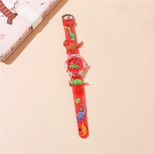 Detailed view of the 3D cartoon dinosaur charms on the red silicone kids' watch strap