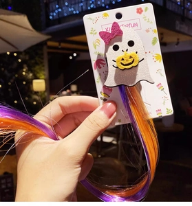 Ghost hair clip with glitter bow and purple-orange extensions for Halloween party