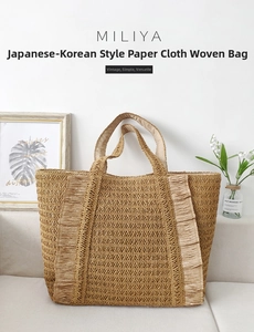 Close-up of beige woven paper tote bag featuring stylish ruffles in a cozy home setting
