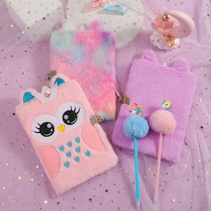 Detailed plush A5 notebook set featuring cartoon owl and unicorn designs with pom-pom pens