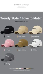Detail of multi-color cotton baseball caps with embroidered Believe letters and curved brims