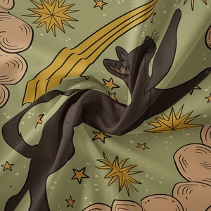 Macro detail of Bohemian cat tapestry fabric showing soft woven texture and starry print