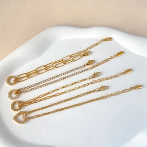 Elegant set of four gold-plated titanium steel bracelets featuring crystal and heart designs