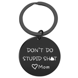 Custom black round stainless steel keychain with humorous white Mom engraving