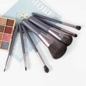 Detail of 7-piece soft makeup brush set with matte handles and synthetic bristles