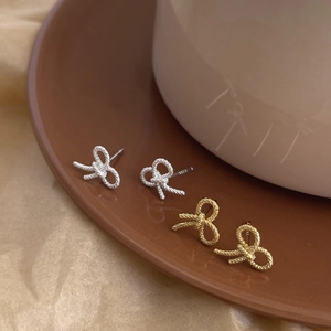 Minimalist S925 sterling silver bow knot stud earrings in gold and silver finish
