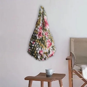 Floral pleated stretch tote bag with bubble texture and large capacity displayed on wall