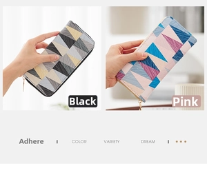 Detailed view of geometric patchwork wallets in black and pink with pebbled leather texture