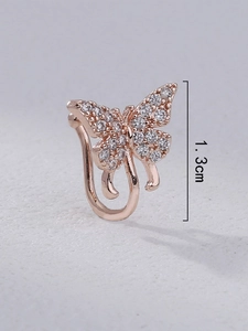 Detailed close-up of rose gold butterfly nose clip with crystals measuring 1.3cm height