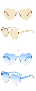 Champagne and gradient blue heart-shaped rimless sunglasses in multiple viewing angles