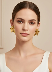Close-up of model wearing 18k gold stainless steel large flower statement earrings.