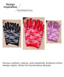 Close-up of floral lace gloves in black, red, and purple showing delicate mesh patterns