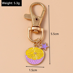 Detailed view of lemon slice keychain with dimensions 5.5cm length and 5.3g weight