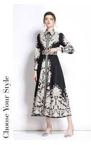 Close-up of ethnic totem print dress with long sleeves and a matching waist belt detail