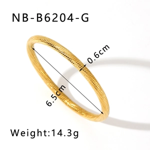 Detail shot of golden woven mesh textured hollow bangle with precise 0.6cm width specifications