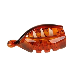 Glossy amber banana hair clip for high ponytail styling with sturdy resin teeth