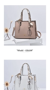 Detail view of khaki and white leather handbags with silk scarf handles and gold logo