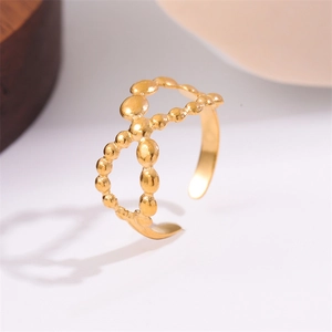 Golden double-layer cross ring featuring a beaded design with an adjustable open band style