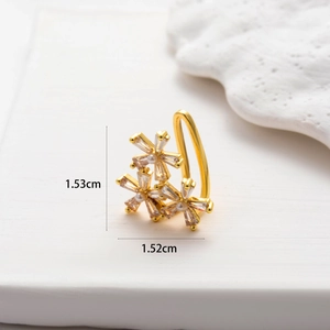 Detailed view of butterfly ear cuff with cubic zirconia and pearls, 1.53cm height