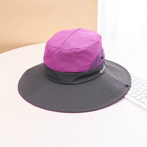 Detail view of purple and grey sun hat featuring breathable mesh and wide brim