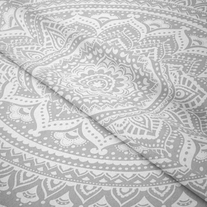 Close-up detail of soft Mandala tapestry fabric showing fine grey and white bohemian patterns