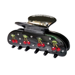 Elegant black acetate hair claw clip with sparkling rhinestone cherry design for women