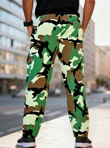 Rear view of men's camouflage cargo pants showing the loose fit and outdoor urban style