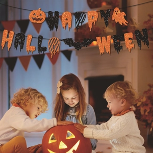 Glittery Happy Halloween banner with bats and pumpkins for festive home party decoration