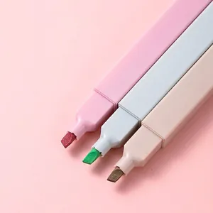 Three-piece set of pastel highlighters with chisel tips in pink, blue, and beige colors
