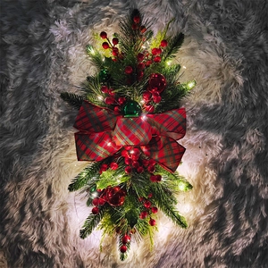 Christmas teardrop swag with pine needles, berries, plaid bows, and warm LED lights