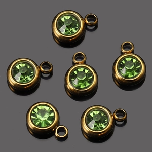 Set van 6 groene ronde kristallen geboortesteen bedeltjes in antiek brons