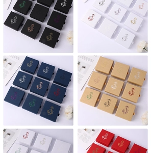 Detailed grid view of drawer-style jewelry gift boxes in multiple elegant colors