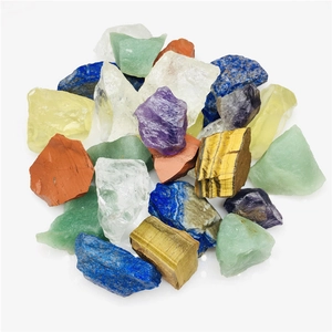Macro shot of assorted natural crystal stones including amethyst and tiger eye