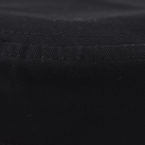 Macro shot of black cotton fabric texture with parallel double-stitched reinforced seams