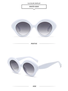 Detail view of oval white frame sunglasses with gray gradient lenses showing front and side angles
