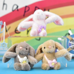 Three cute plush bunny keychains in pink, grey, and brown colors