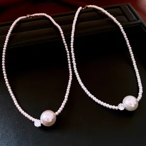 Elegant French luxury pearl and zircon beaded necklace set on black jewelry box background