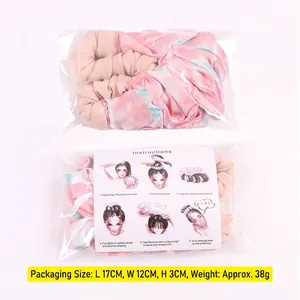 Silk heatless hair curler set with pink tie-dye and beige scrunchies in retail packaging