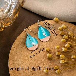 Detail of bohemian water drop earrings with pearls and size specs: 4cm by 2cm and 4.9g