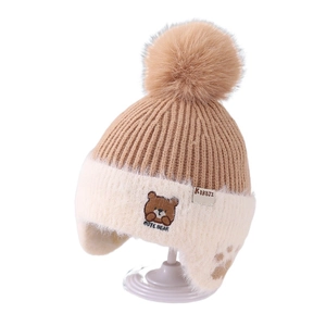 Winter knit baby earflap hat with cute bear embroidery and fluffy faux fur pom-poms